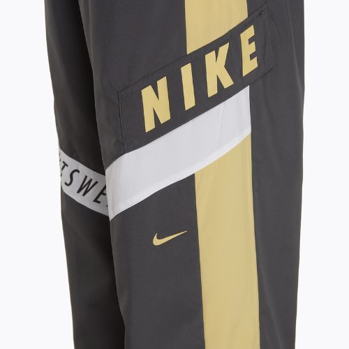Штани жіночі Nike Sportswear Woven High-Waisted dark smoke grey/saturn gold/white