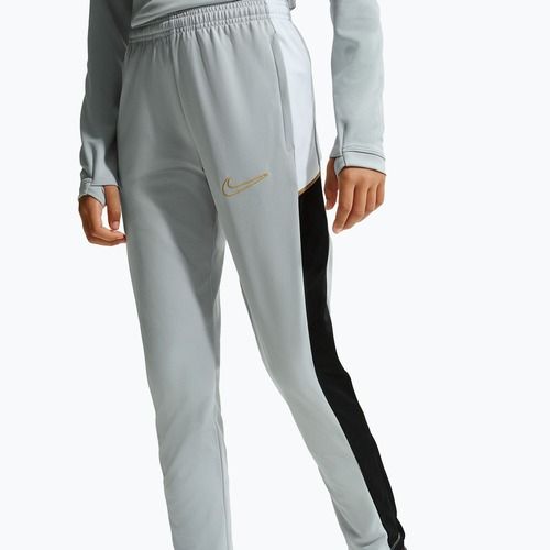 Штани дитячі Nike Academy Dri-Fit Jr light smoke grey/white/black/metallic gold