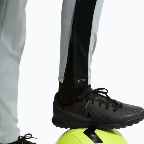 Штани дитячі Nike Academy Dri-Fit Jr light smoke grey/white/black/metallic gold