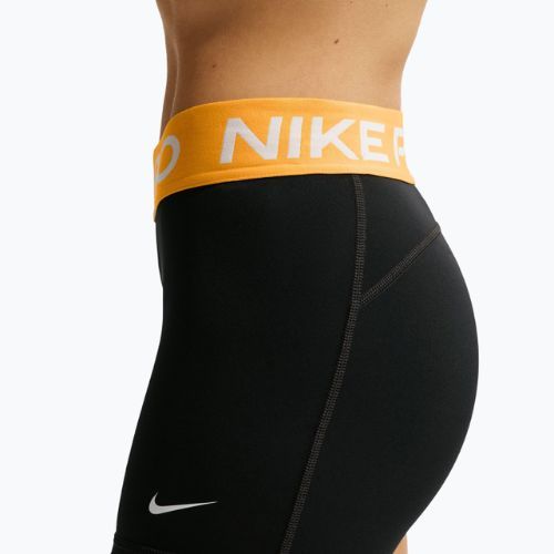 Шорти жіночі Nike Pro Mid-Rise Biker 3" black/university gold/white