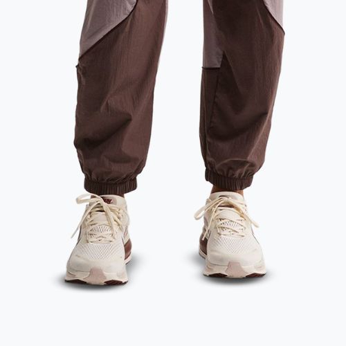 Штани для бігу жіночі Nike Swift UV Repel Mid-Rise tattoo/light violet ore