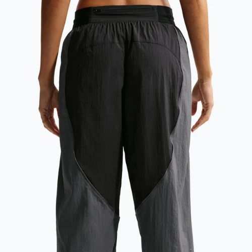 Штани для бігу жіночі Nike Swift UV Repel Mid-Rise black/iron grey