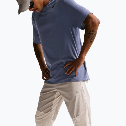 Штани для бігу чоловічі Nike Stride Repel Woven cream li/birch/natural