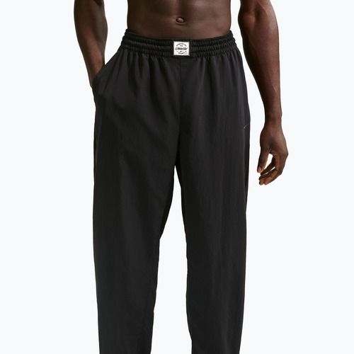 Штани чоловічі Nike N.A.C. Dri-Fit Woven black/pale ivory/black