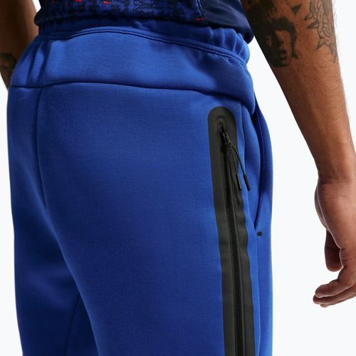 Штани футбольні чоловічі Nike FFF Tech Fleece Joggers game royal/metallic copper