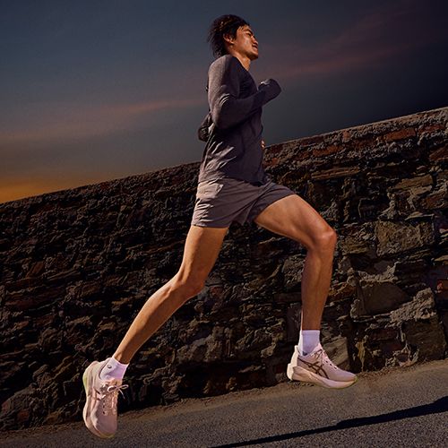 Кросівки для бігу чоловічі ASICS Novablast 6 white/orange glow