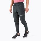 Штани тренувальні чоловічі Nike Winterized Woven чорні CU7351-010