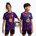 Футболка футбольна дитяча Nike FC Barcelona Dri-Fit Pre-Match noble red/mineral yellow