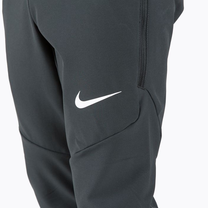 Штани тренувальні чоловічі Nike Winterized Woven чорні CU7351-010 4