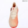 Футбольне взуття дитяче PUMA Future 9 Pro FG/AG Jr sugared almond/puma white/ultra red/puma black 8