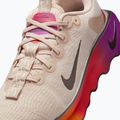 Кросівки для тренувань жіночі Nike Motiva SE pearl white/pale ivory/vivid purple/mtl gold grain 8