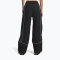 Штани жіночі Under Armour Unstoppable Woven Wind ultimate black/anthracite/anthracite 3