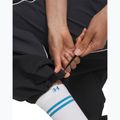Штани жіночі Under Armour Unstoppable Woven Wind ultimate black/anthracite/anthracite 4