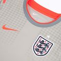 Футболка футбольна дитяча Nike England Pre-Match pewter grey/bright crimson 3