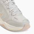 Кросівки для тренувань чоловічі Nike Air Monarch IV light bone/spruce aura/sanddrift 7