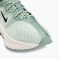 Взуття жіноче Nike Motiva 2 barely green/steam/sail/black 7
