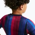 Футболка футбольна дитяча Nike FC Barcelona Dri-Fit Stadium Home deep garnet/blue void/mineral yellow 11