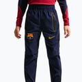 Штани футбольні дитячі Nike FC Barcelona Tech Woven blackened blue/black/mineral yellow 4