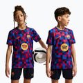 Футболка футбольна дитяча Nike FC Barcelona Dri-Fit Pre-Match noble red/mineral yellow