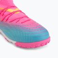 Кросівки футбольні дитячі PUMA Future 9 Match TT + Mid Jr poison pink/puma wht/sun stream/bright aqua/puma blk 7