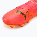 Бутси футбольні дитячі PUMA Future 7 Pro FG/AG Jr sunset glow/puma black/sun stream 7