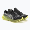 Чоловічі бігові кросівки ASICS Novablast 3 чорні/зелені з сухим листям 4