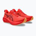 Кросівки для бігу жіночі ASICS Novablast 5 flash red/edo purple 3