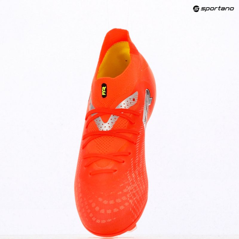 Кросівки футбольні дитячі PUMA Future 9 Pro FG/AG Jr glowing red/puma white/puma black/puma silver 9