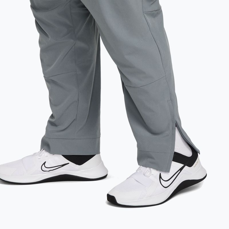 Штани чоловічі Nike Unlimited smoke grey/black/smoke grey 7