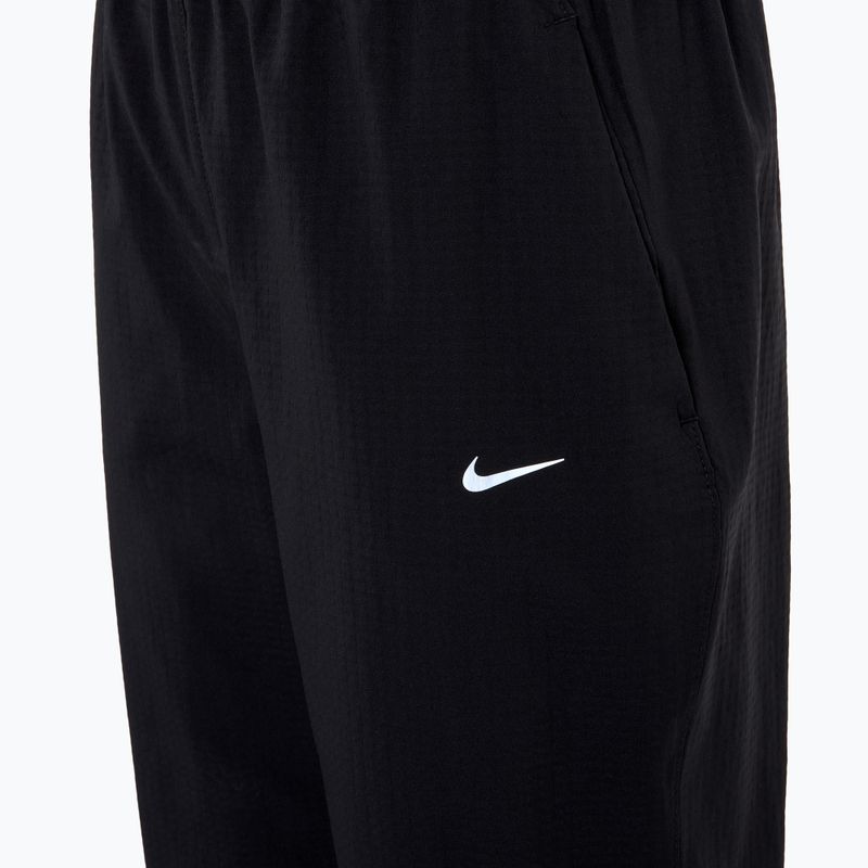 Штани для бігу жіночі Nike Dri-Fit Fast Mid-Rise 7/8 black 3