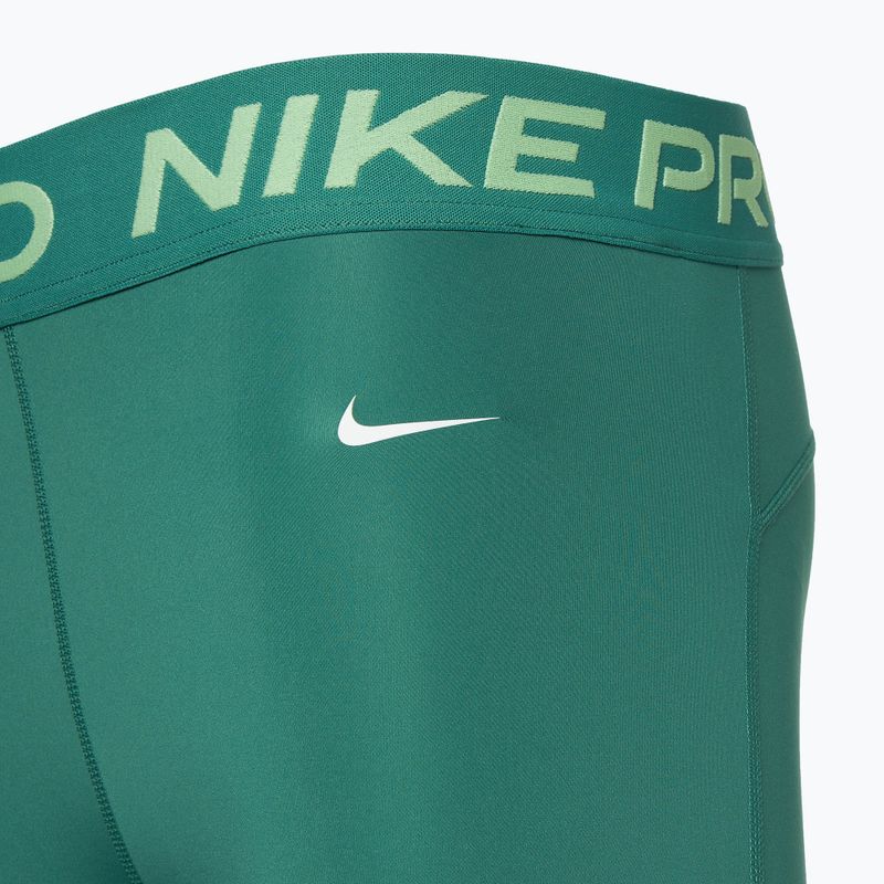 Легінси для тренувань жіночі Nike Pro Dri-FIT Mid-Rise 7/8 Graphic bicoastal/vapour green/white 4