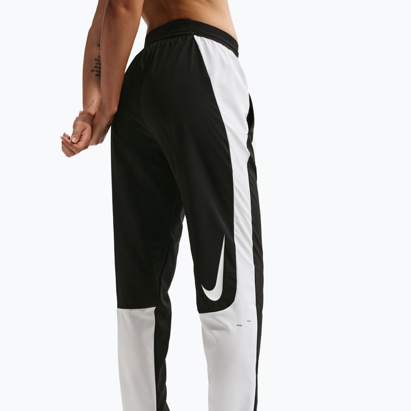 Жіночі штани для бігу Nike Tempo Swoosh Dri-Fit Mid-Rise 7/8 black/white 4