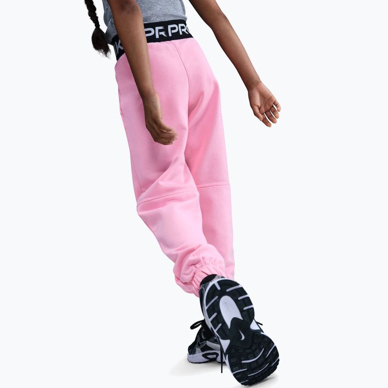 Штани дитячі Nike Pro Fleece Dri-Fit med soft pink/med soft pink/black/white 6
