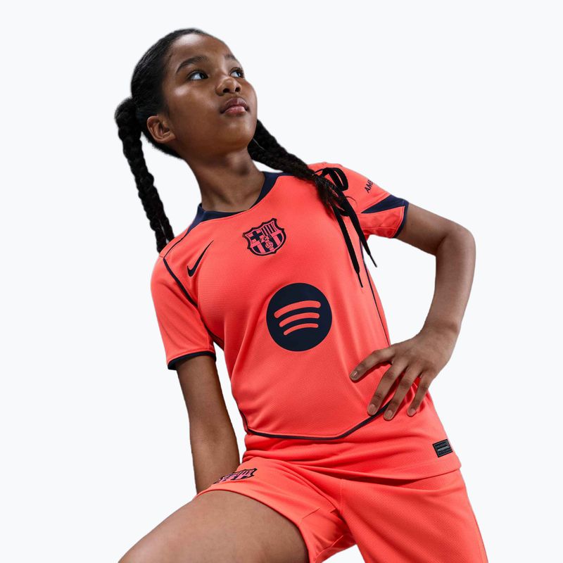 Футболка футбольна дитяча Nike FC Barcelona 2025/26 Stadium Third Jr bright mango/midnight navy/midnight navy 6