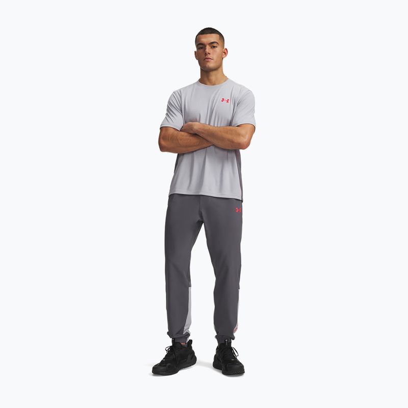 Штани для тренувань чоловічі Under Armour Tech Utility Woven Pants castlerock/mod gray/racer red 2