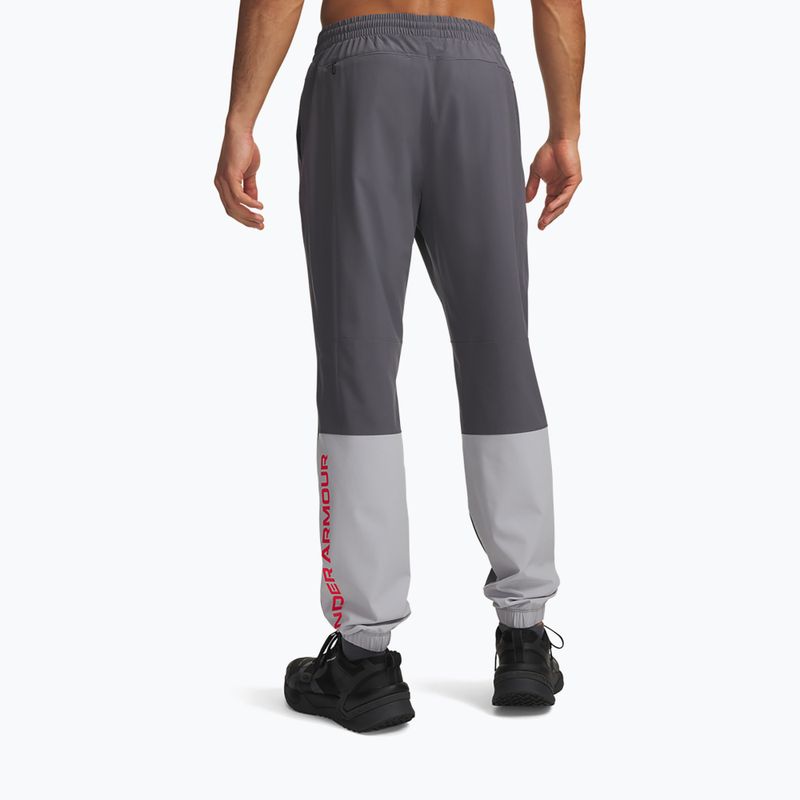 Штани для тренувань чоловічі Under Armour Tech Utility Woven Pants castlerock/mod gray/racer red 3