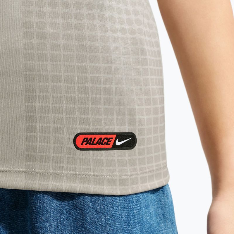 Футболка футбольна дитяча Nike England Pre-Match pewter grey/bright crimson 7