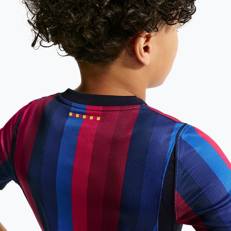 Футболка футбольна дитяча Nike FC Barcelona Dri-Fit Stadium Home deep garnet/blue void/mineral yellow 11