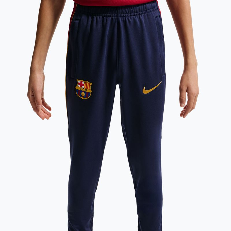 Штани футбольні дитячі Nike FC Barcelona Strike Dri-Fit blackened blue/noble red/yellow 7