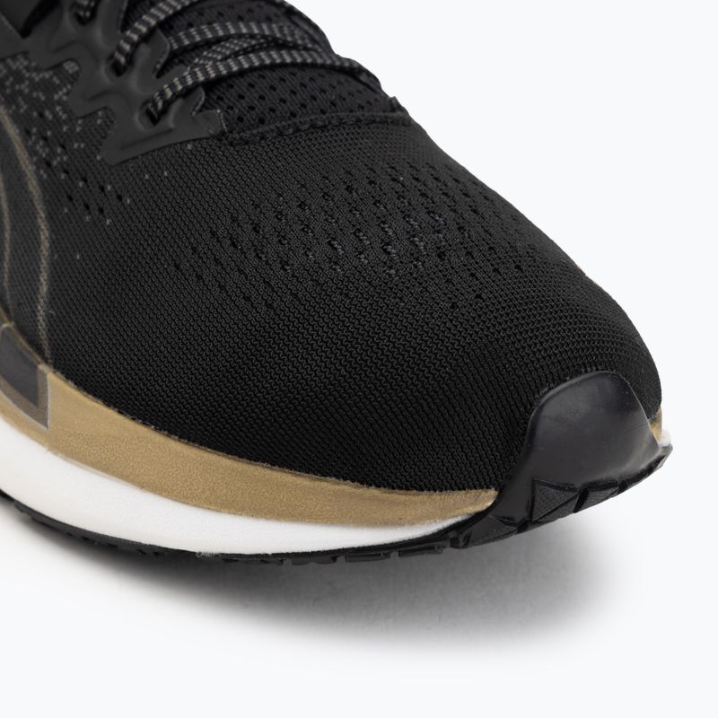 Кросівки для бігу жіночі Puma Eternity Nitro black/gold/white 7