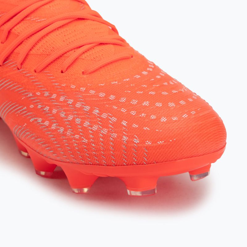 Кросівки футбольні дитячі PUMA Future 9 Match FG/AG Jr glowing red/puma white/puma black/puma silver 7