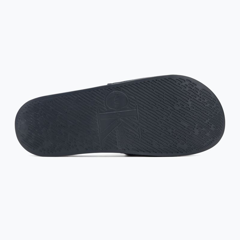 Чоловічі шльопанці Calvin Klein YM0YM01271 Slide Monogram Cv потрійні темно-сині Calvin 4