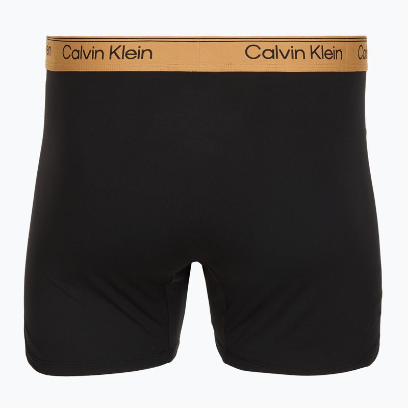 Боксерки чоловічі Calvin Klein LV00NB4410 Brief black w/bronze flash wb/black/oliv 5