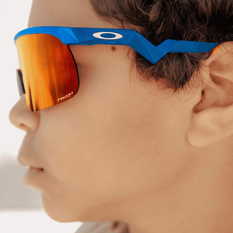 Дитячі сонцезахисні окуляри Oakley Resistor небесно-блакитні/призмово-рубінові 14