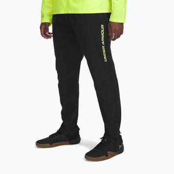 Штани для бігу чоловічі Under Armour Storm Run black / high vis yellow / reflective