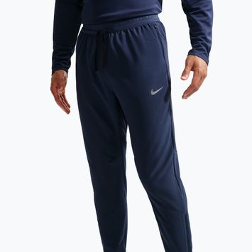 Чоловічі бігові штани Nike Stride Dri-Fit Woven midnight navy