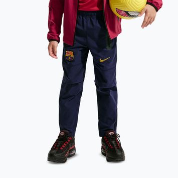 Штани футбольні дитячі Nike FC Barcelona Tech Woven blackened blue/black/mineral yellow
